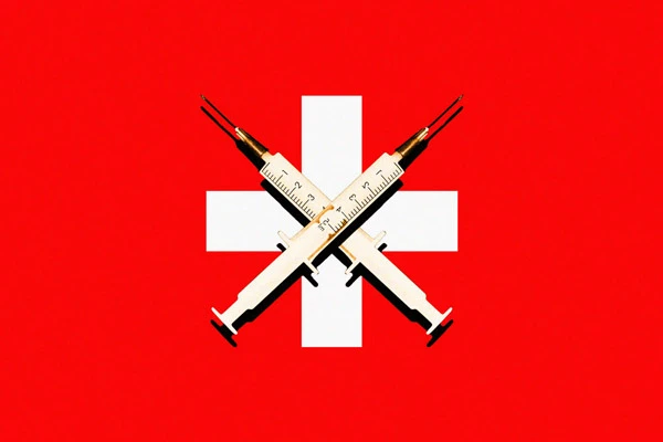 A red hopsital emergency sign, with two vaccine doses forming an x over the hospital sign. Photo Illustration by Erin O’Flynn/The Daily Beast/Getty Images